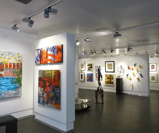 Modern art gallery with paintings and sculptures